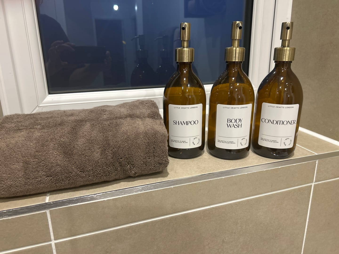 Customer photo review of Set of 3 Bathroom Reusable Amber Glass Bottles 500 ML with Stainless Steel Pump