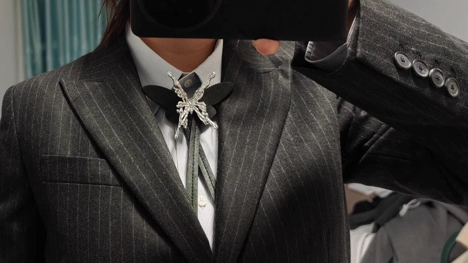 Customer photo review of "ButterflyWasteland" Platinum Plated Gothic Butterfly Bolo Tie Necklace, Adjustable Lariat Choker
