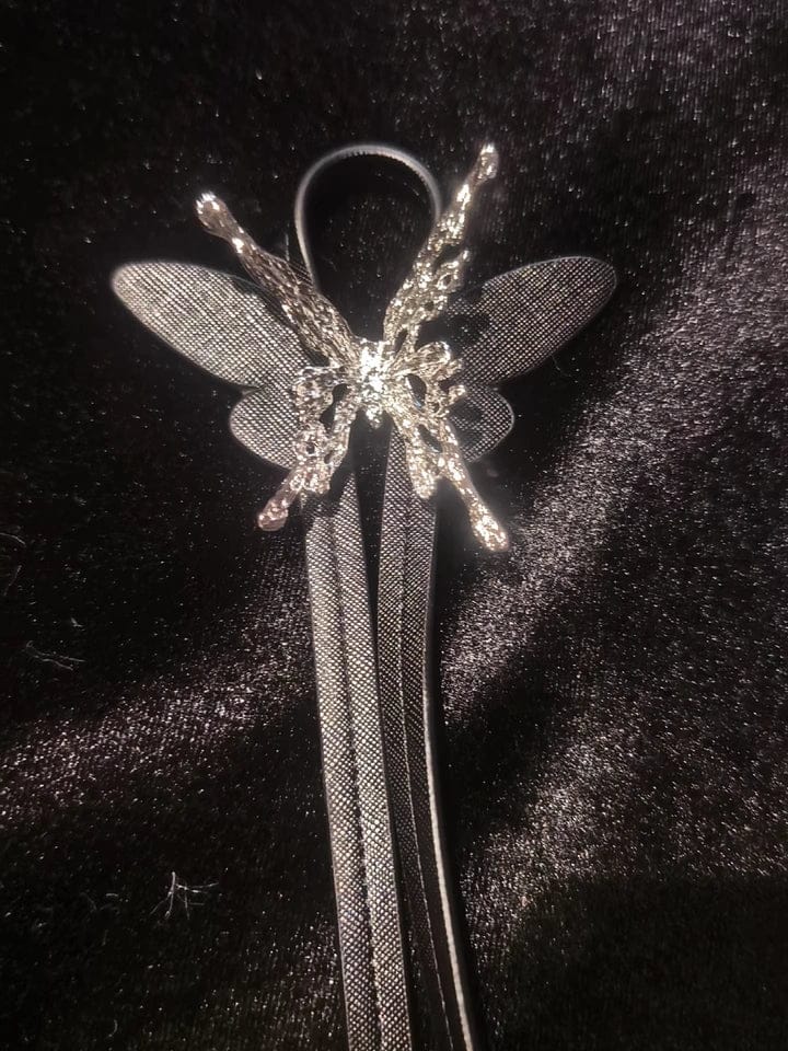 Customer photo review of "ButterflyWasteland" Platinum Plated Gothic Butterfly Bolo Tie Necklace, Adjustable Lariat Choker