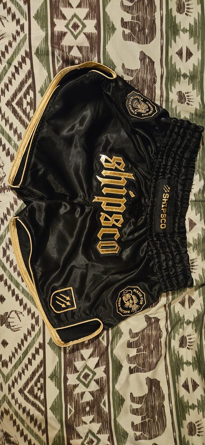 Customer photo review of Deep Waters II Black and Gold Muay Thai Shorts