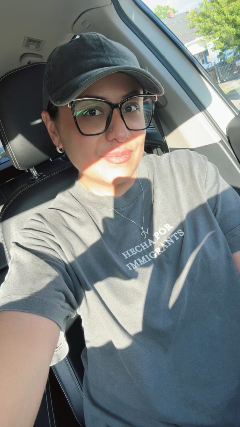 Customer photo review of 'Hecha Por Immigrants' Embroidered Grey Shirt
