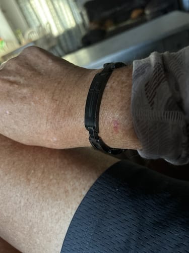 Customer photo review of Lord's Prayer Bracelet (Size M-L or L-XL): Helps Pair Veterans With A Service Dog Or Shelter Dog