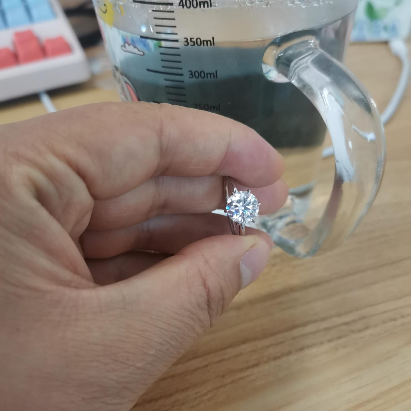 Customer photo review of Rodiffy Moissanite 2.0 Ct ~ 4.0 Ct Round Cut 6 Prong Engagement Ring For Women