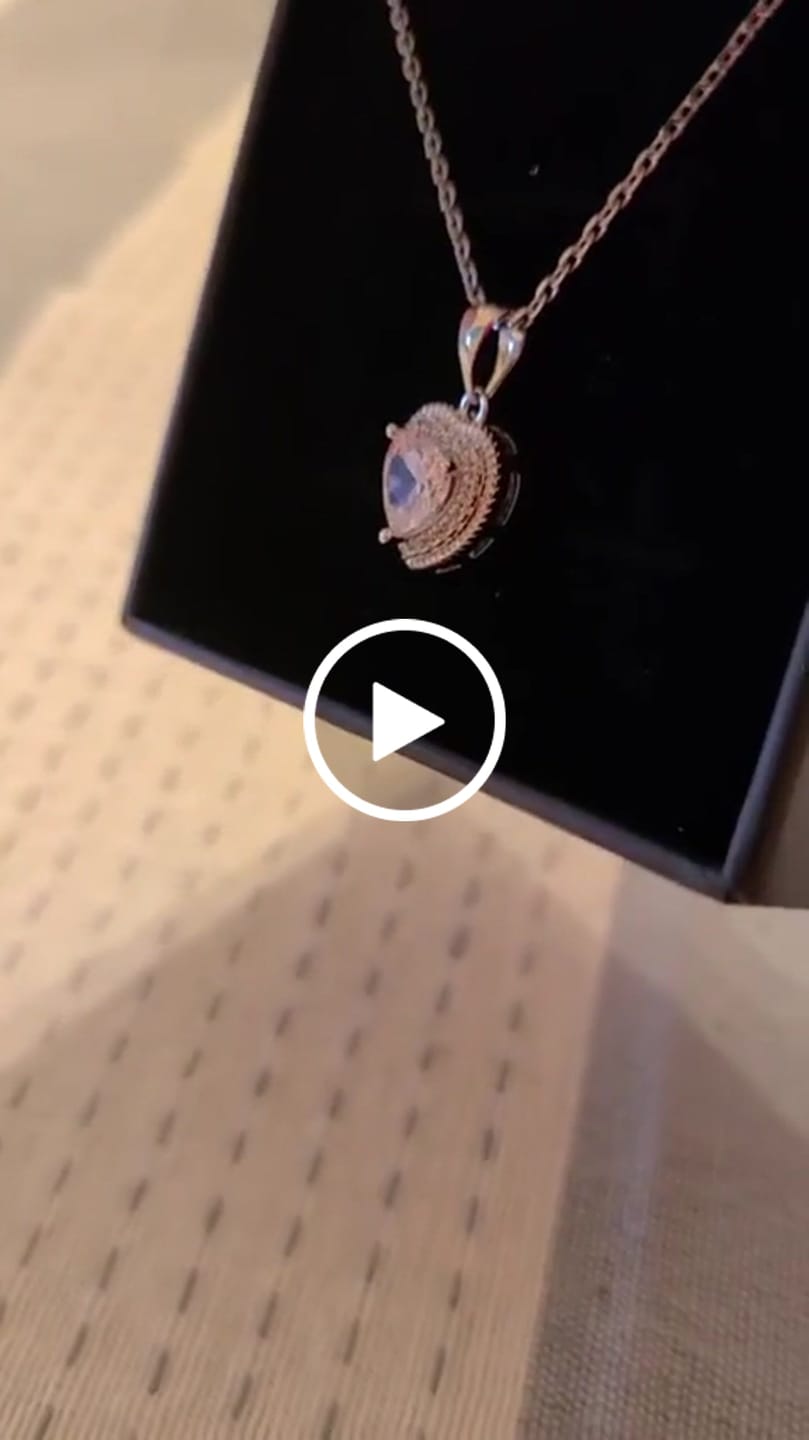 Customer video review of Coraline 18k White Gold Plated Heart Pendant Necklace with Simulated Diamond Crystals