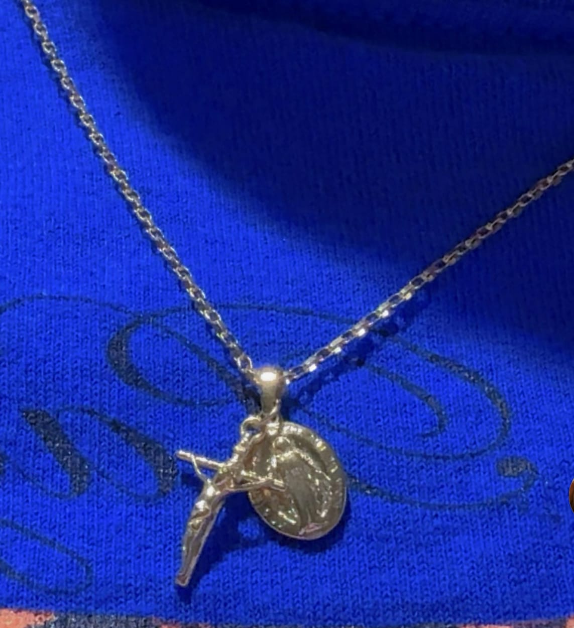Customer photo review of Gold Dainty Crucifix and Miraculous Medal Necklace