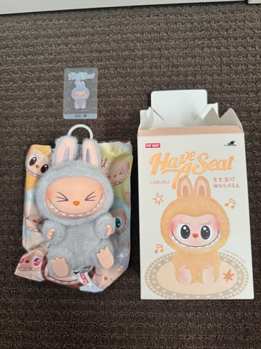 Customer photo review of Pop Mart Labubu The Monsters Have a Seat Vinyl Plush Pendant (Single Blind Box)