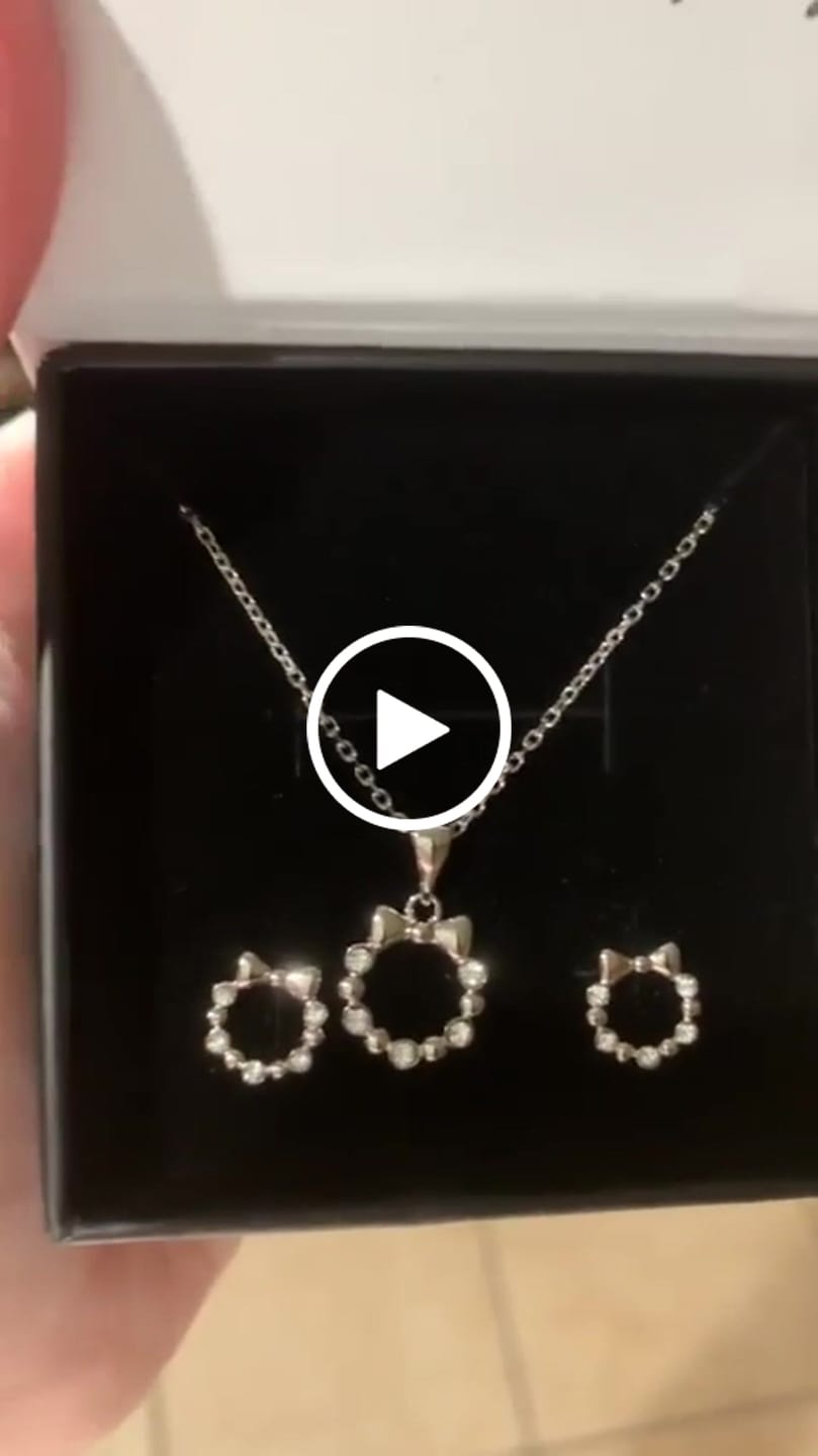 Customer video review of Edith 18k White Gold Plated Silver Ribbon Necklace and Earring Set with Swarovski Crystals