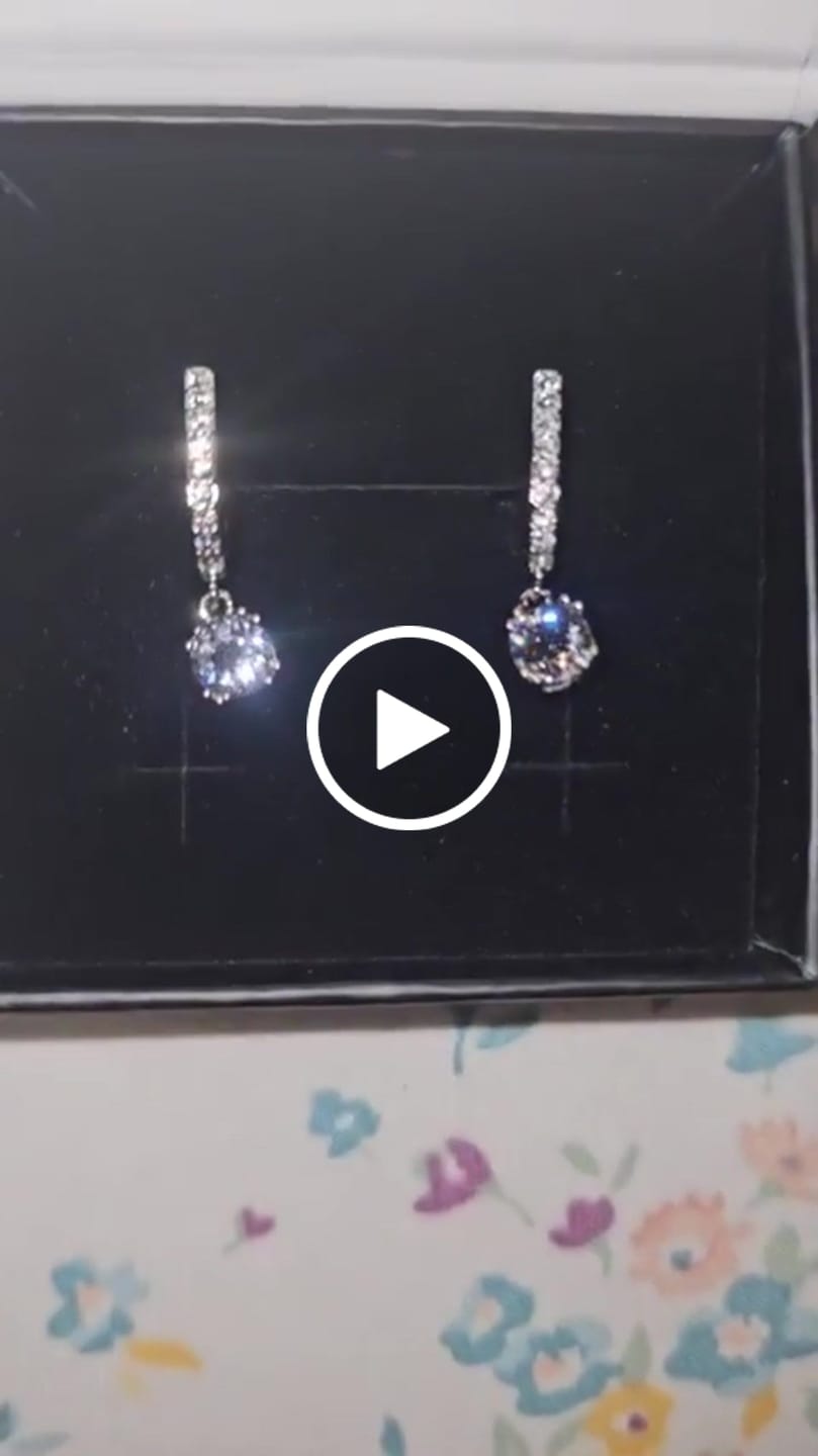 Customer video review of McKenzie 18k White Gold Plated Drop Dangle Earrings with Swarovski Crystals