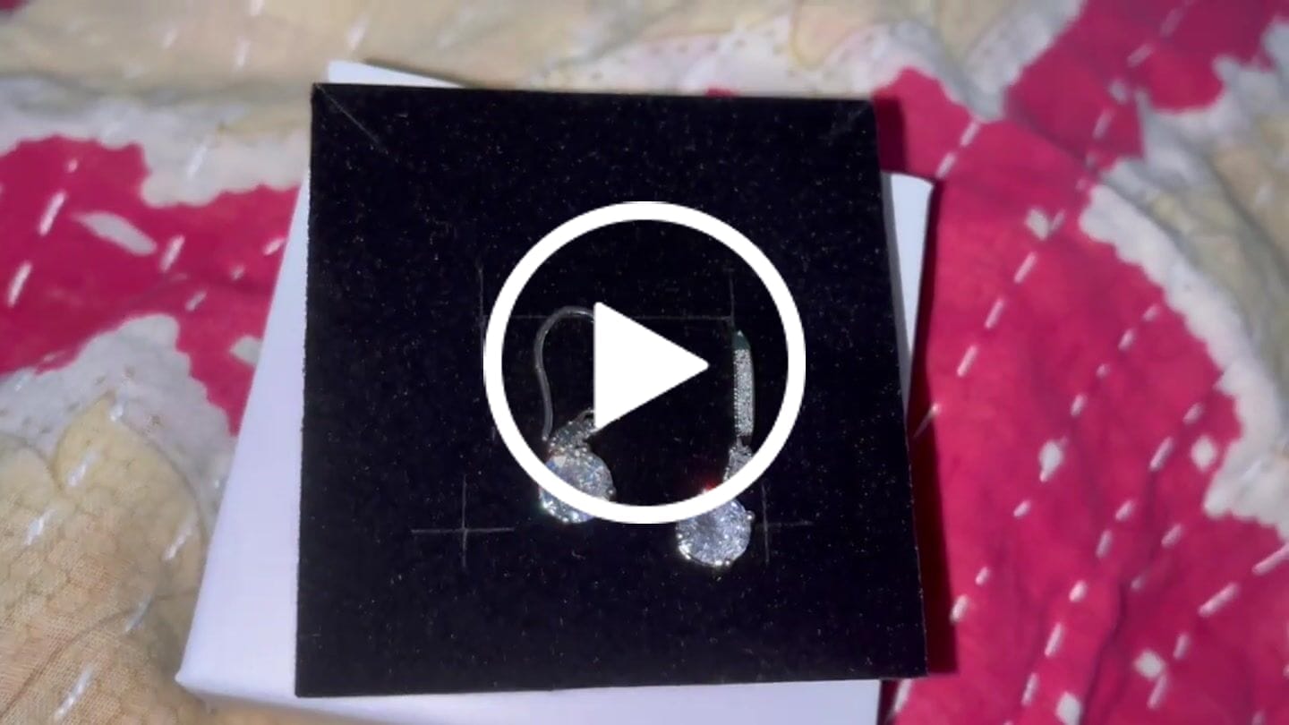 Customer video review of Valerie 18k White Gold Plated Drop Earrings with Simulated Diamond Crystals