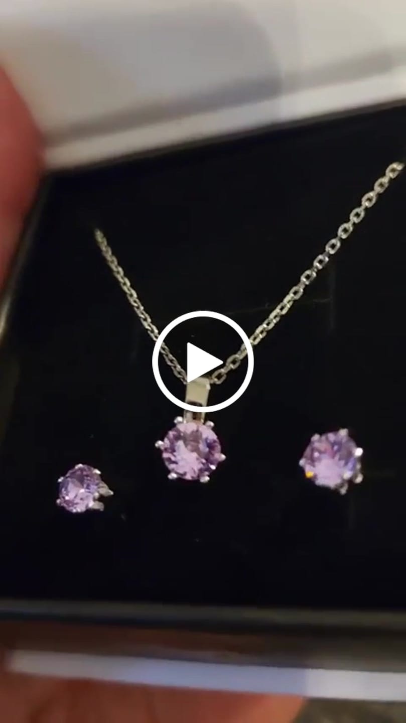 Customer video review of Birthstone Earrings 18k White Gold Plated Stud Earrings with 1ct Solitaire Swarovski Crystals