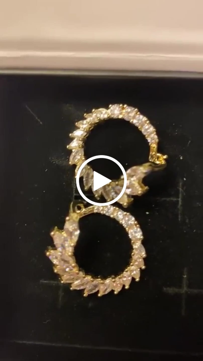 Customer video review of Adelyn 18k Gold Plated Sideways Hoop Earrings with Simulated Diamond Crystals — Final Sale