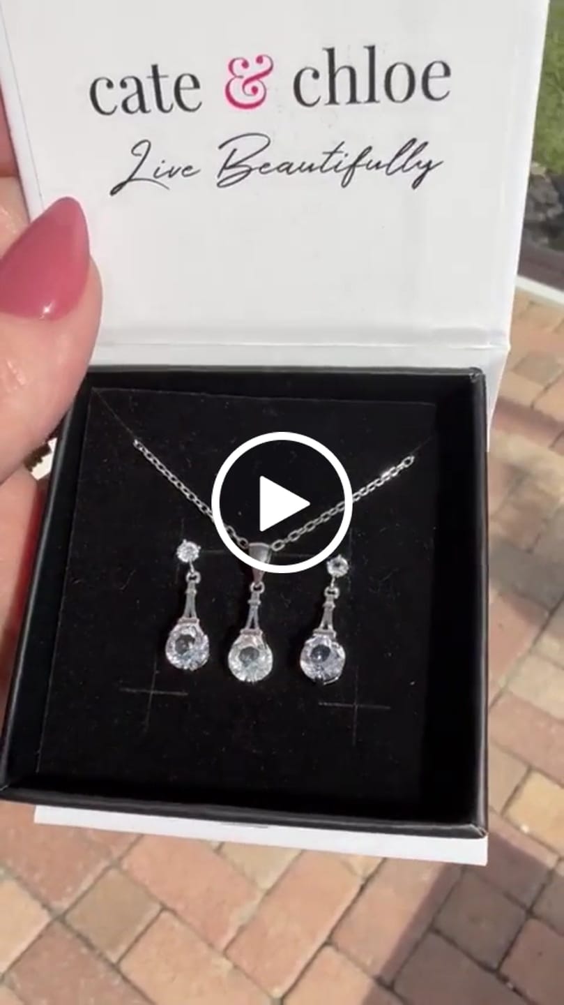 Customer video review of Isla 18k White Gold Plated Dangle Earrings with Round Swarovski Crystals