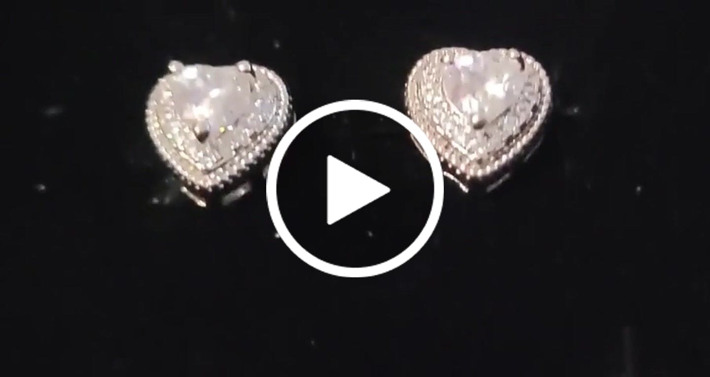 Customer video review of Coraline 18k White Gold Plated Silver Heart Stud Earrings with Simulated Diamond Crystals