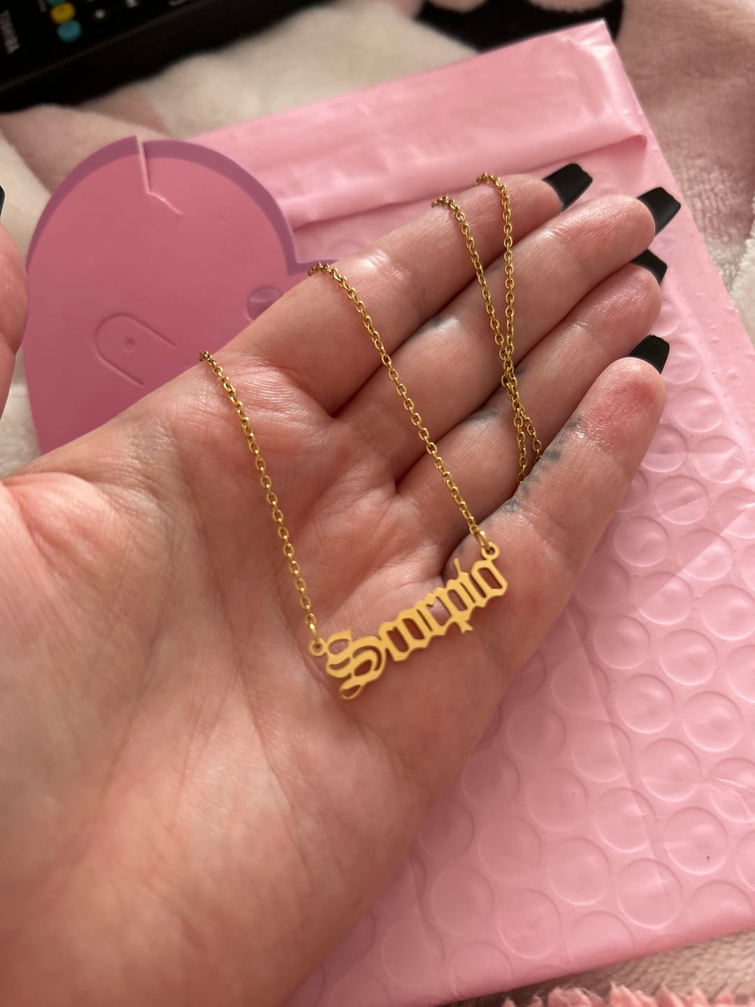 Customer photo review of star sign necklaces