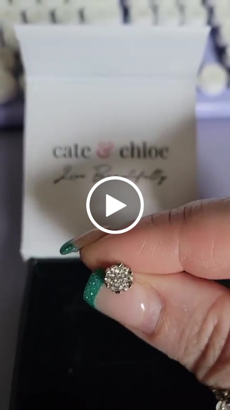 Customer video review of Remy 18k White Gold Plated Stud Earrings with Heart Accents and Swarovski Crystals