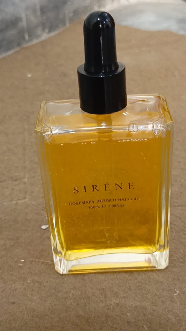 Customer photo review of Rosemary Hair Oil