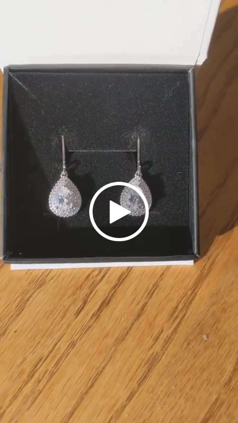 Customer video review of Aurelia 18k White Gold Plated Tear Drop Earrings with Simulated Diamond Crystals