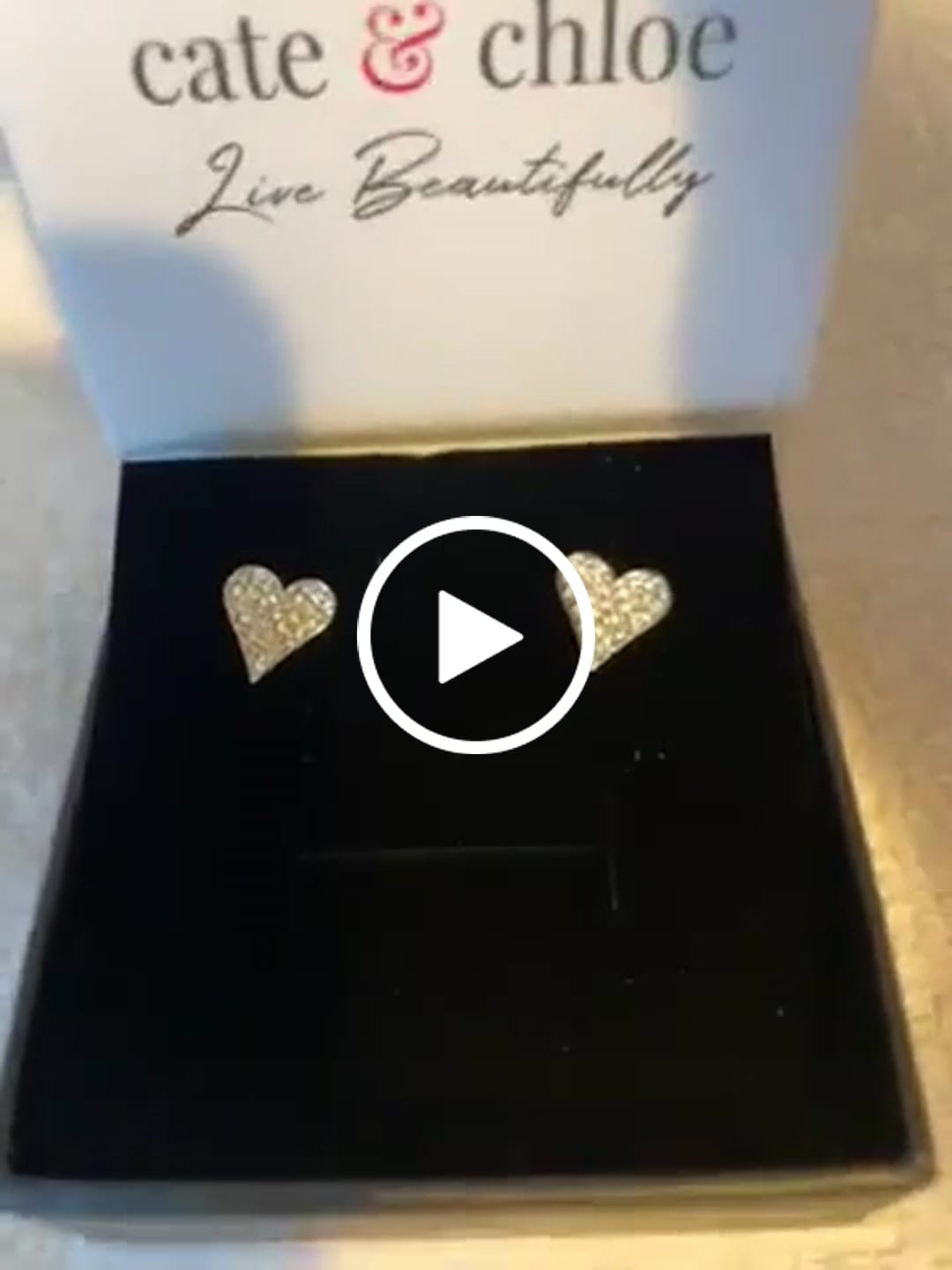 Customer video review of Cecilia 18k White Gold Plated Silver Heart Stud Earrings with Swarovski Crystals