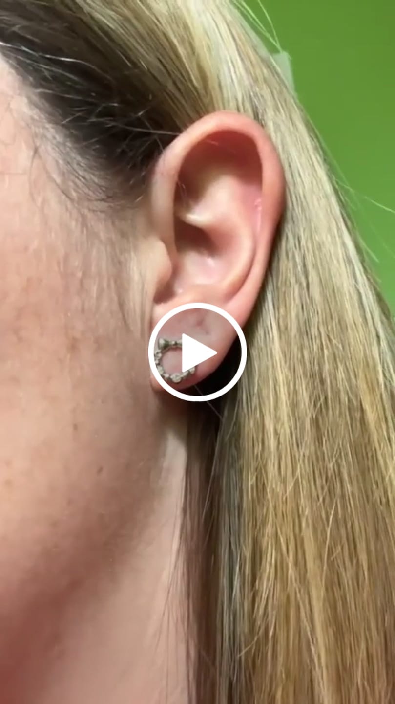 Customer video review of Edith 18k White Gold Plated Silver Ribbon Stud Earrings with Swarovski Crystals