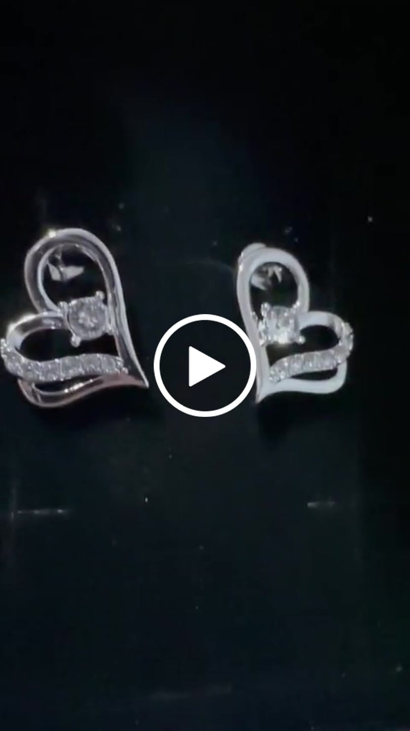 Customer video review of Kara 18k White Gold Plated Silver Heart Stud Earrings with Swarovski Crystals
