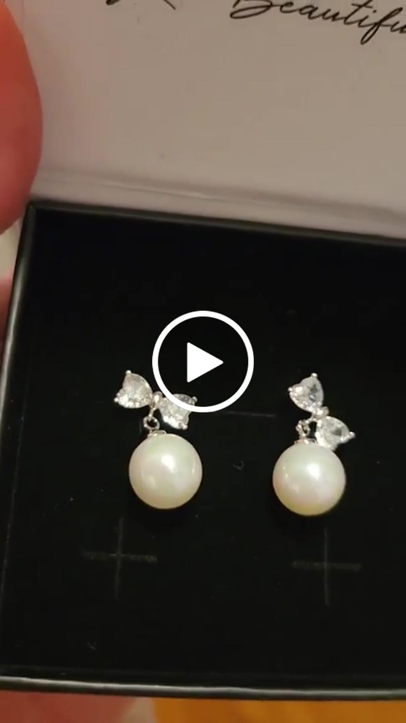 Customer video review of Oakley 18k White Gold Plated Silver Drop Pearl Earrings with Swarovski Crystals