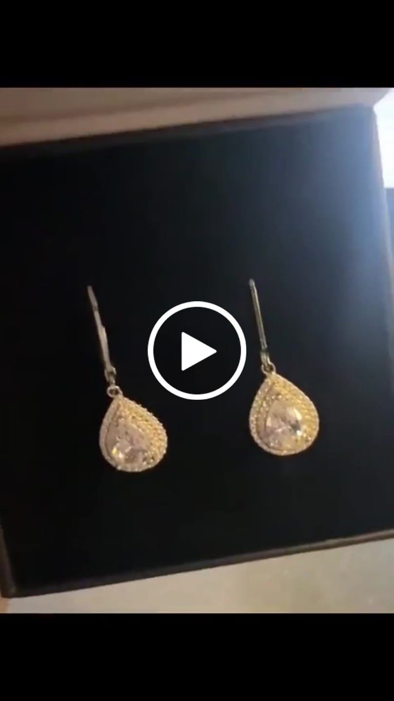 Customer video review of Aurelia 18k White Gold Plated Tear Drop Earrings with Simulated Diamond Crystals