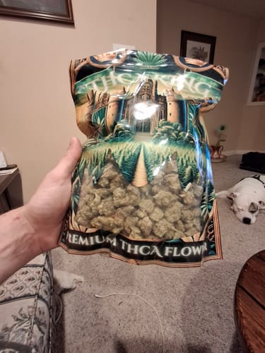 Customer photo review of Tangerine Dream THCA Trim Ounce (28g)