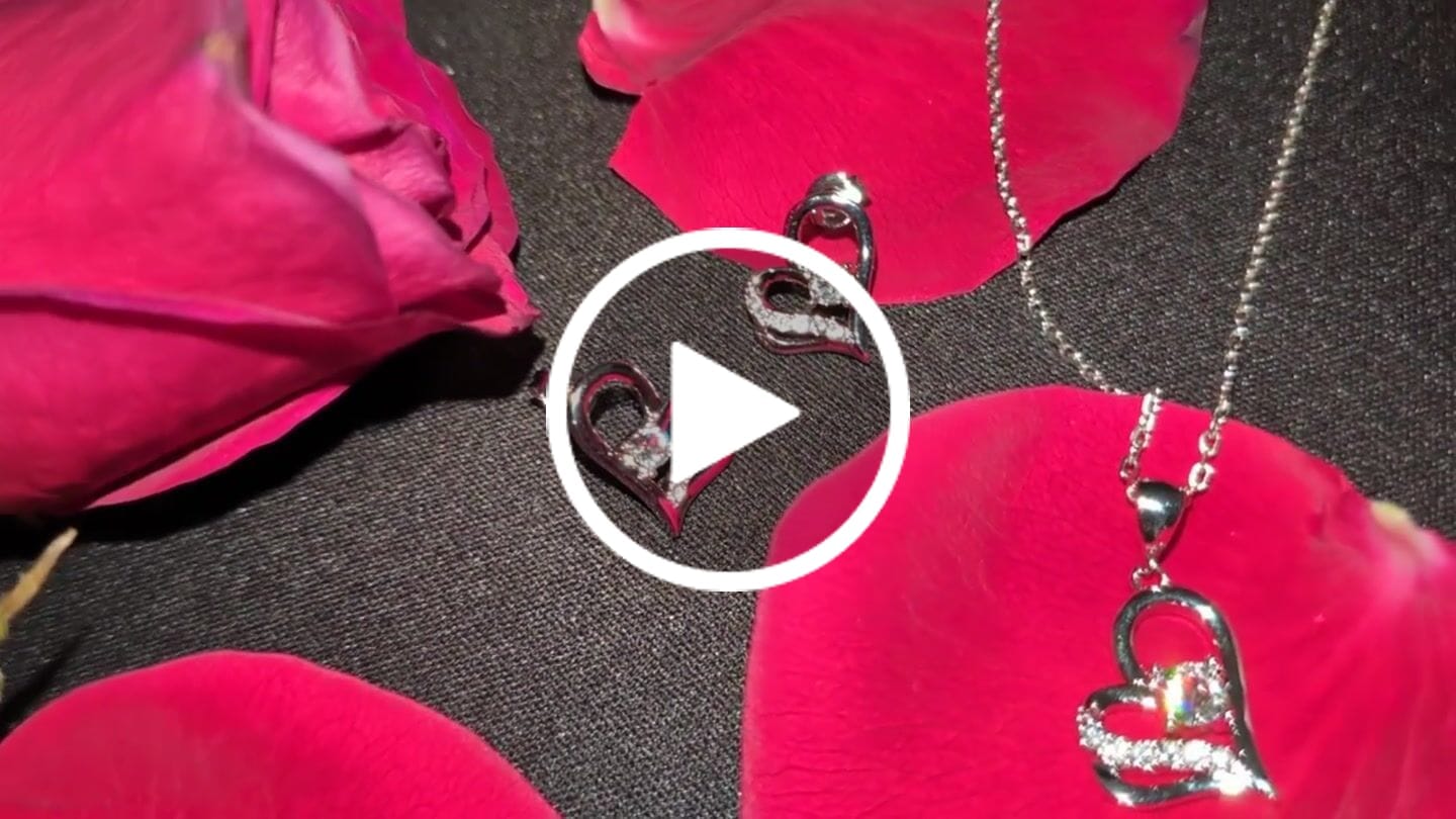 Customer video review of Kara 18k White Gold Plated Silver Heart Necklace and Earring Set with Swarovski Crystals