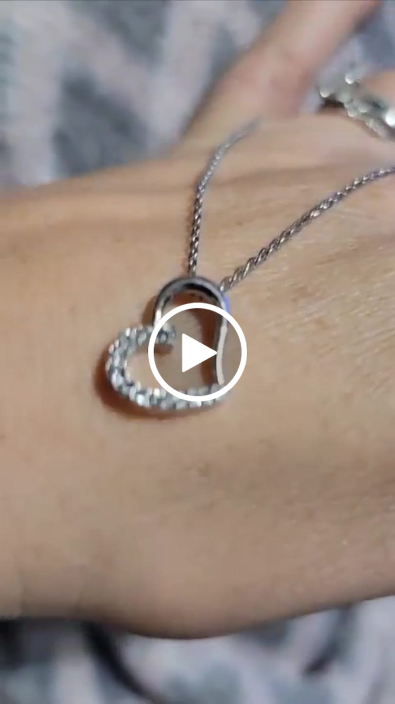Customer video review of Capri 18k White Gold Plated Silver Heart Necklace with Swarovski Crystals