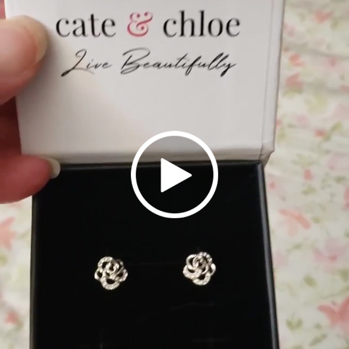 Customer video review of Briella 18k White Gold Plated Silver Flower Stud Earrings with Swarovski Crystals