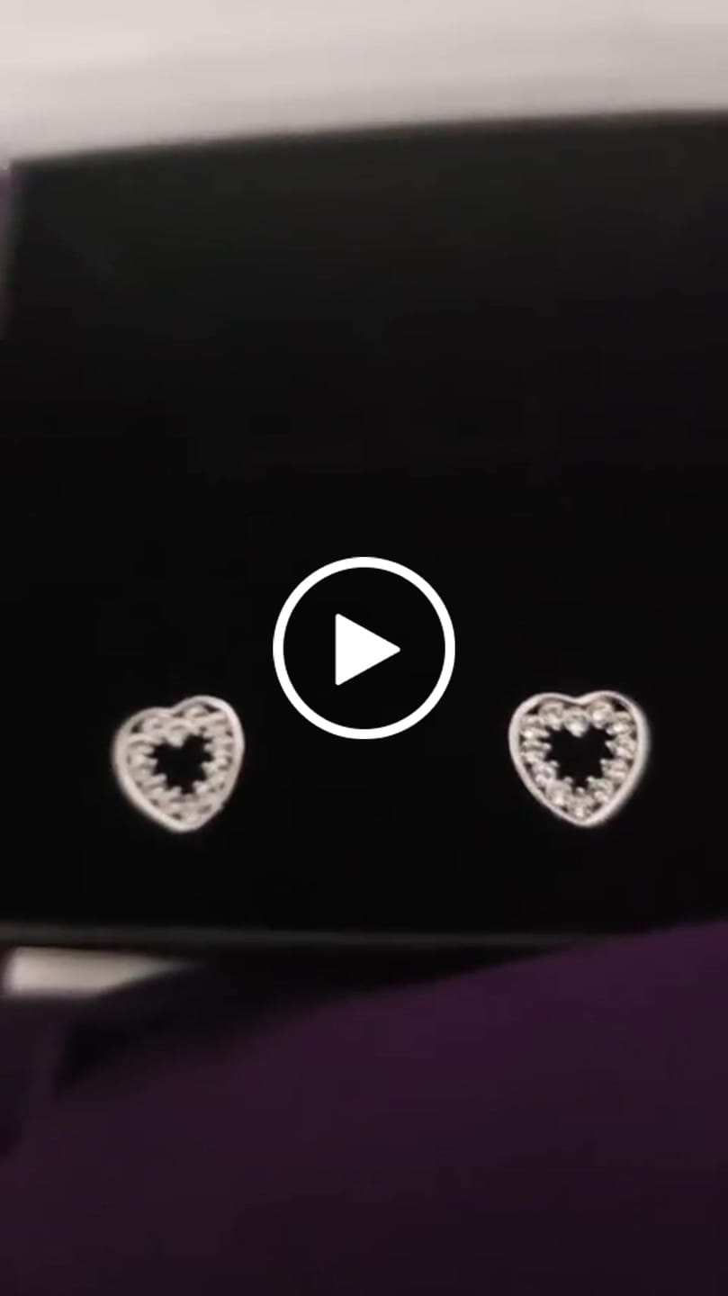 Customer video review of Coraline 18k White Gold Plated Silver Heart Stud Earrings with Simulated Diamond Crystals