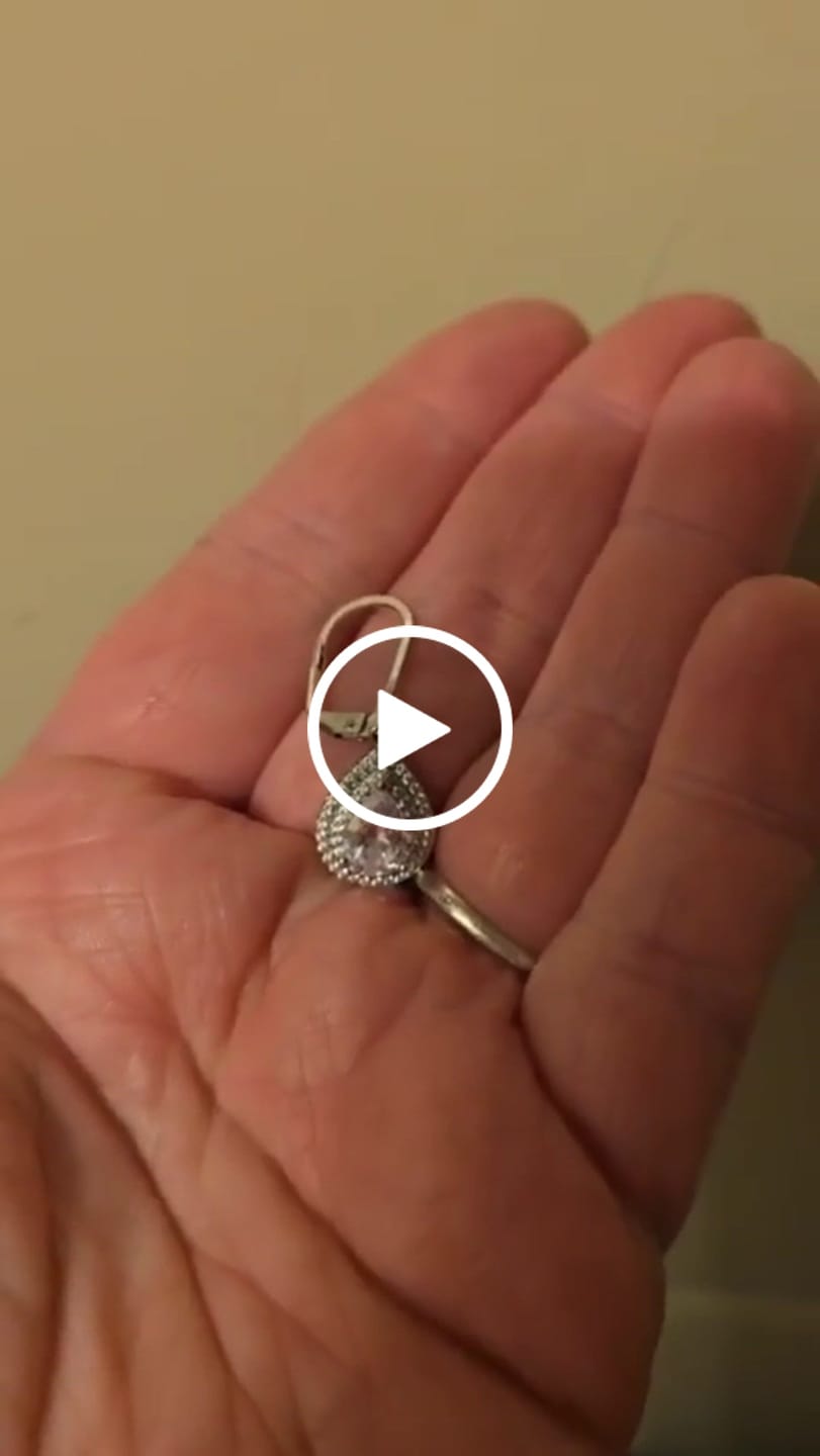 Customer video review of Aurelia 18k White Gold Plated Tear Drop Earrings with Simulated Diamond Crystals