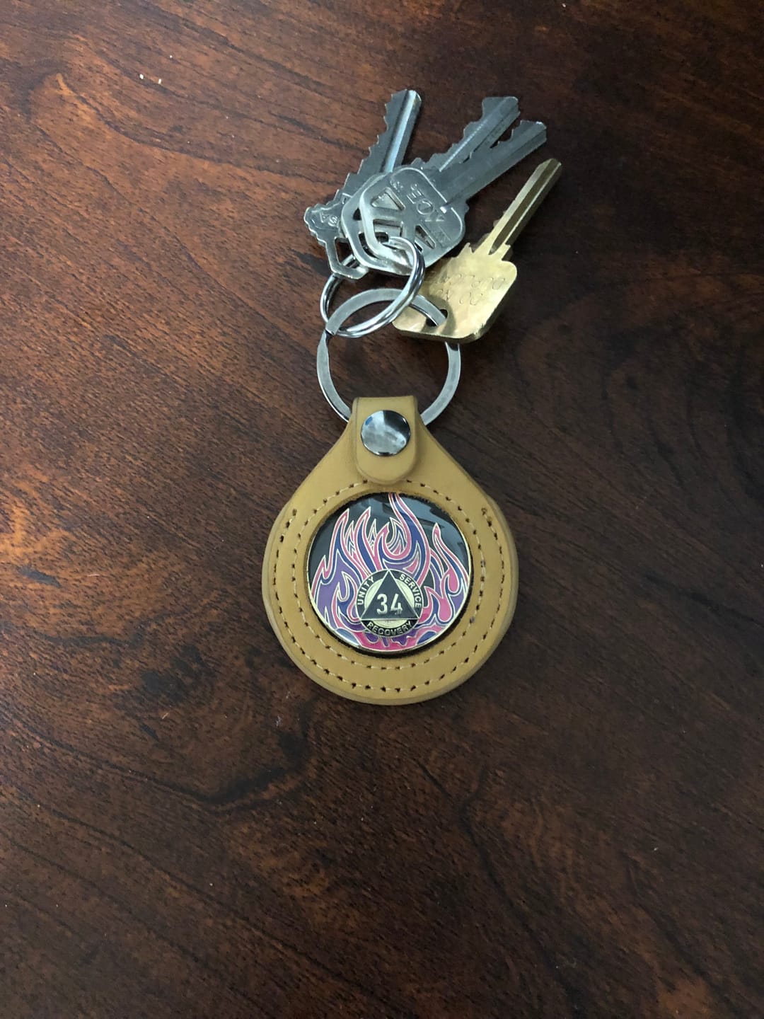 Customer photo review of Sobriety Mint Genuine Leather 34mm AA Medallion Keychain Holder - Recovery Chip/Coin/Token Holder - Tan