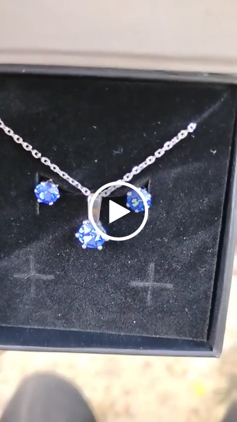 Customer video review of Birthstone Earrings 18k White Gold Plated Stud Earrings with 1ct Solitaire Swarovski Crystals