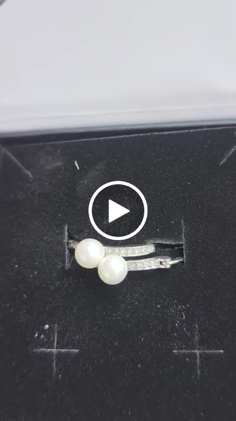 Customer video review of Nyla 18k White Gold Plated 22mm Pearl Hoop Earrings with Swarovski Crystals