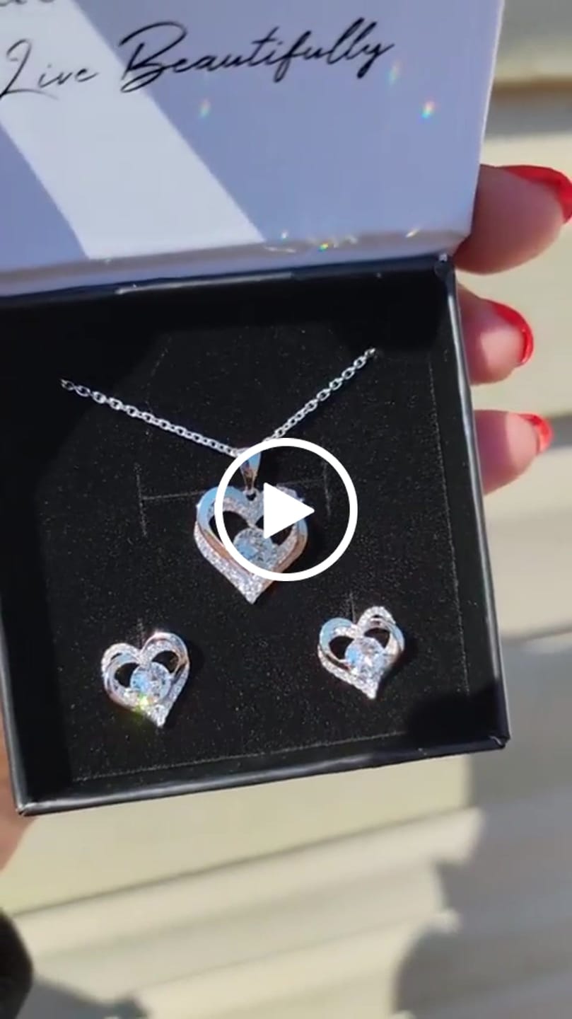 Customer video review of Forever Birthstone 18k White Gold Plated Double Heart Necklace with Swarovski Crystals