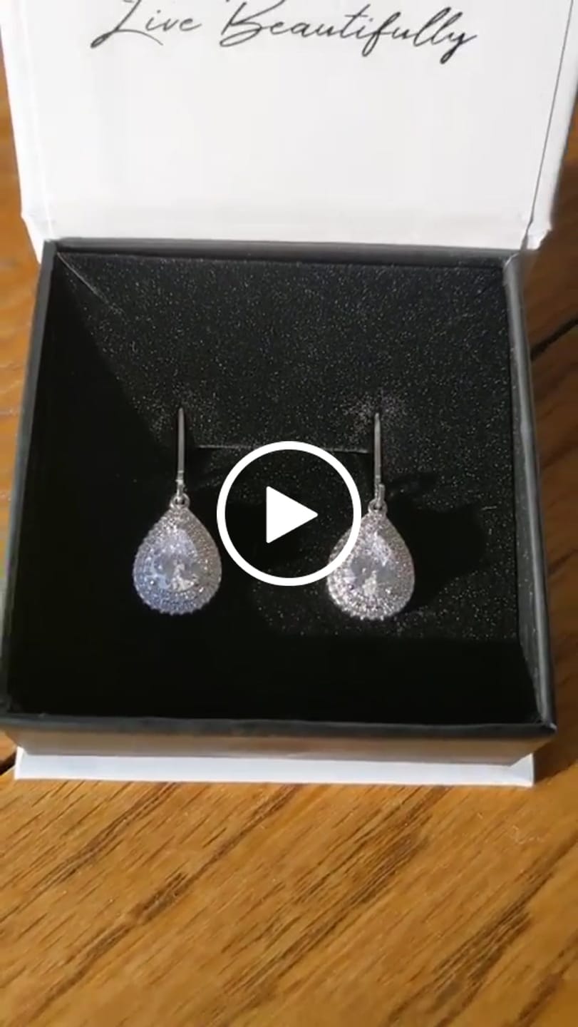 Customer video review of Aurelia 18k White Gold Plated Tear Drop Earrings with Simulated Diamond Crystals