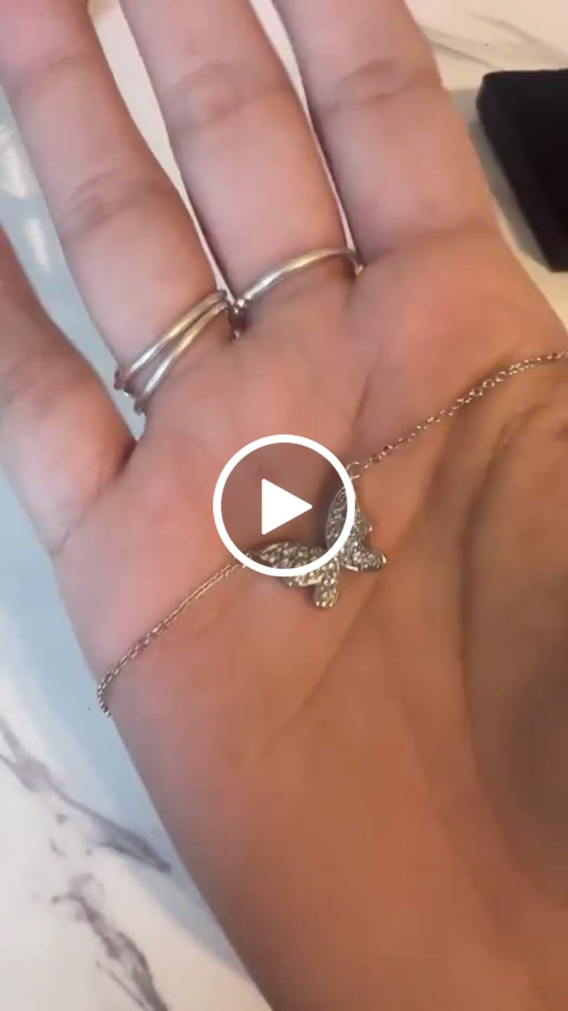Customer video review of Yuenen 18k White Gold Plated Silver Butterfly Necklace and Earring Set with Swarovski Crystals