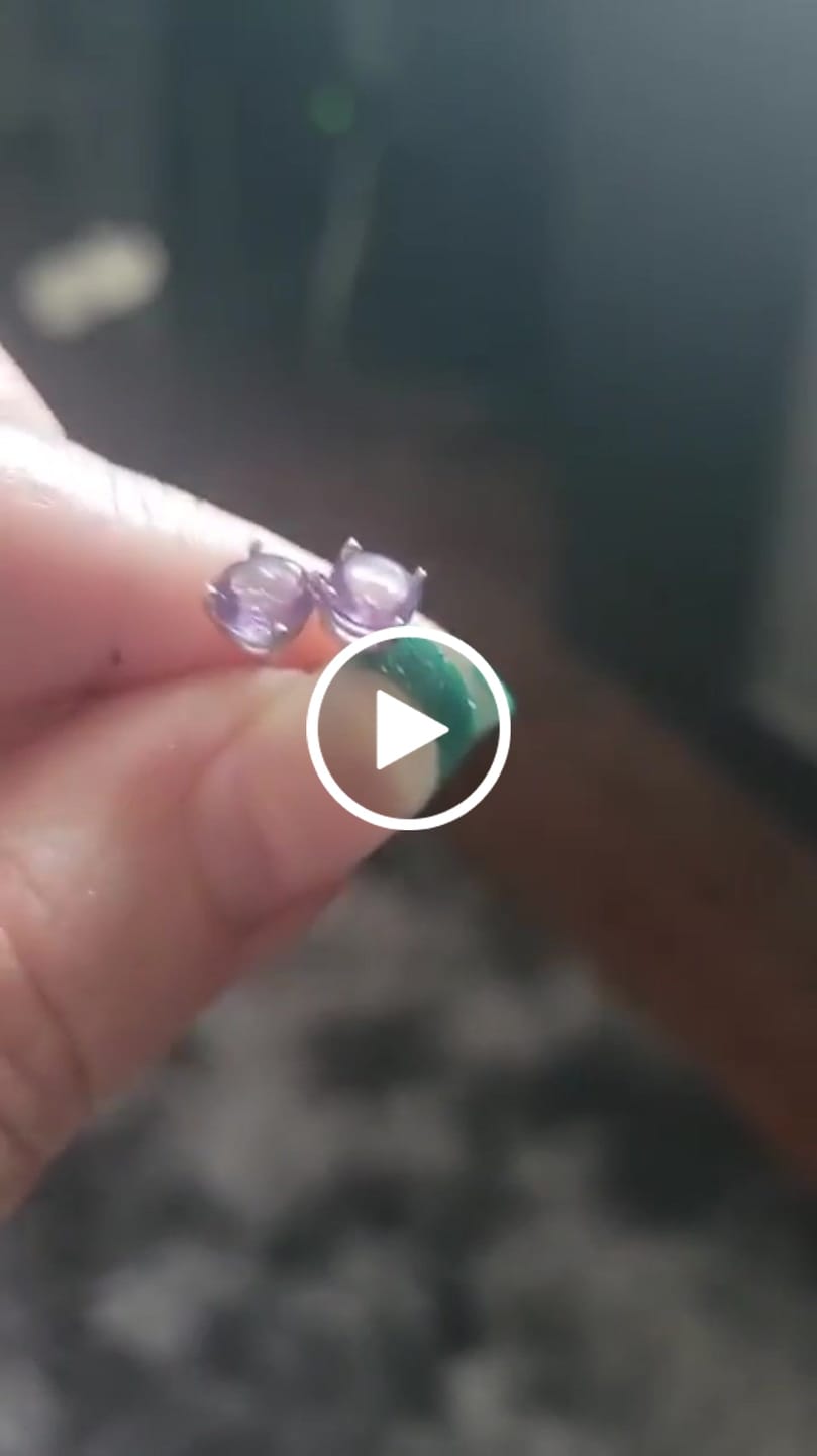 Customer video review of Magnolia 18k White Gold Plated Solitaire Stud Earrings with 1ct Simulated Diamond Crystals