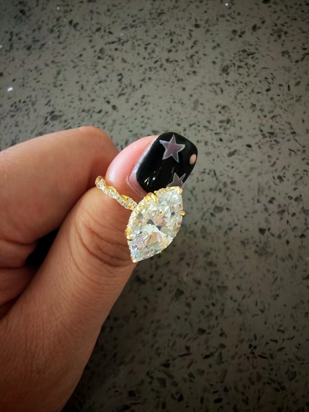 Customer photo review of 4.0Ct Marquise Cut Twist Hidden Halo Engagement Ring Travel Ring In Sterling Silver