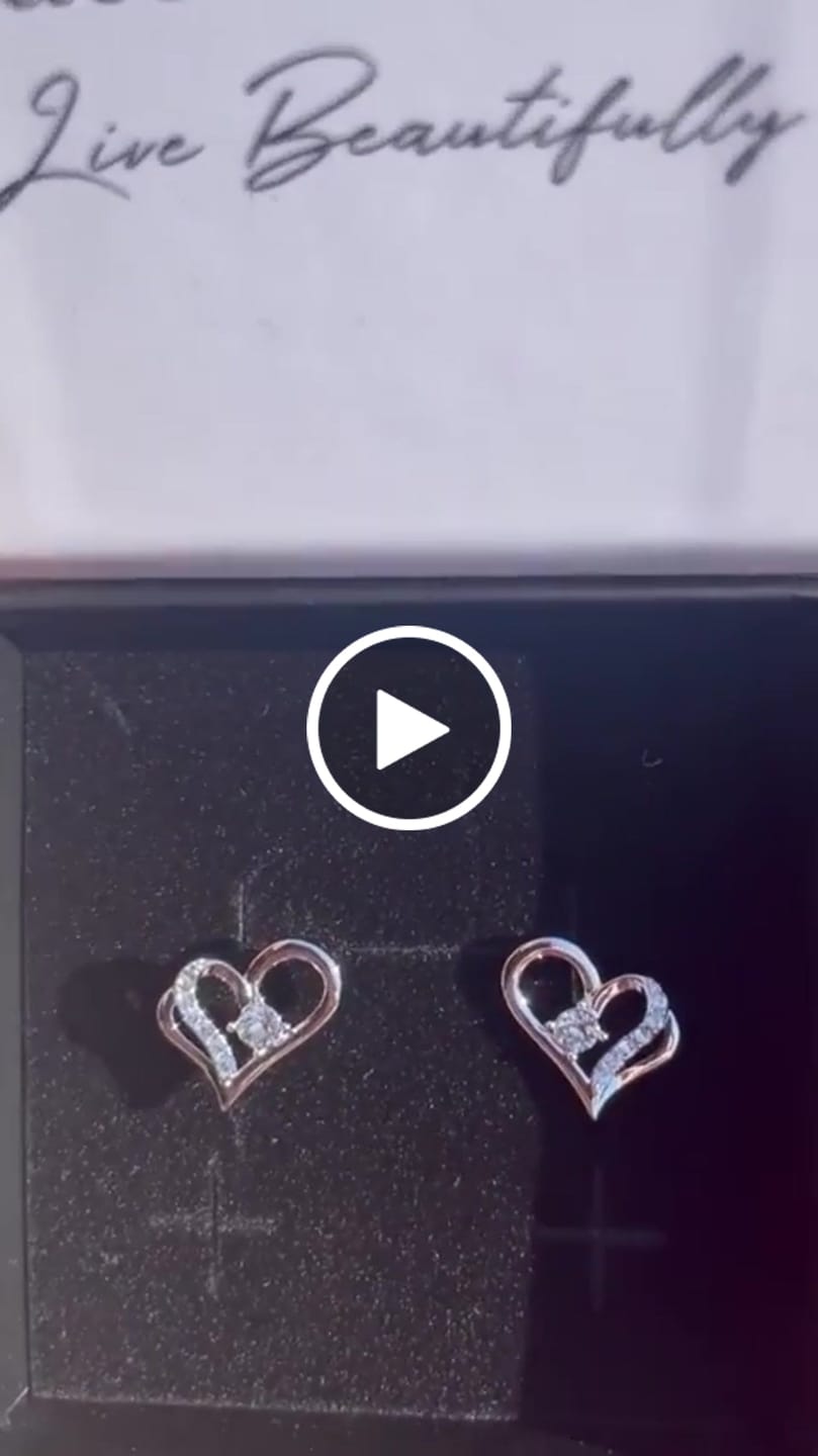 Customer video review of Kara 18k White Gold Plated Silver Heart Stud Earrings with Swarovski Crystals