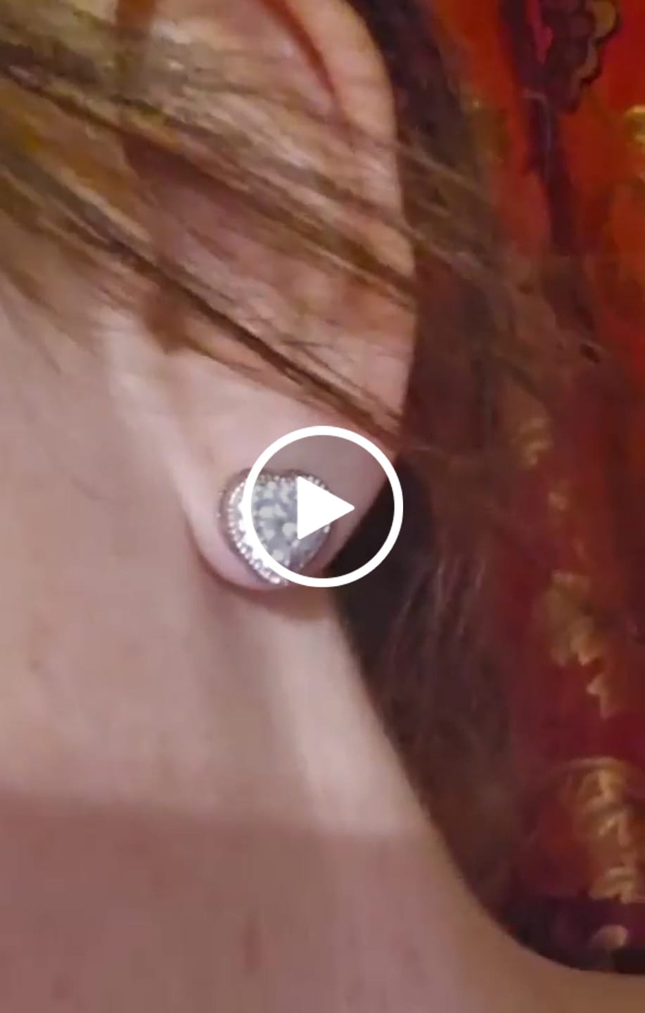 Customer video review of Coraline 18k White Gold Plated Silver Heart Stud Earrings with Simulated Diamond Crystals