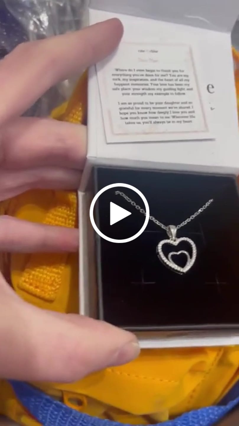 Customer video review of Amorette 18k White Gold Plated Double Heart Pendant Necklace with Pave Simulated Diamond Crystals