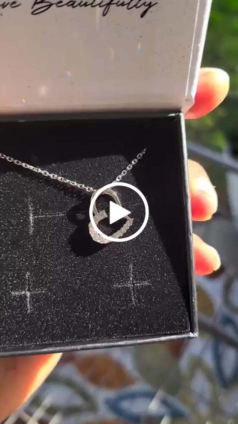 Customer video review of Capri 18k White Gold Plated Silver Heart Necklace with Swarovski Crystals