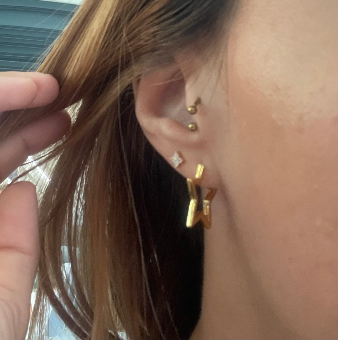 Customer photo review of Pendientes Estrella Centauri