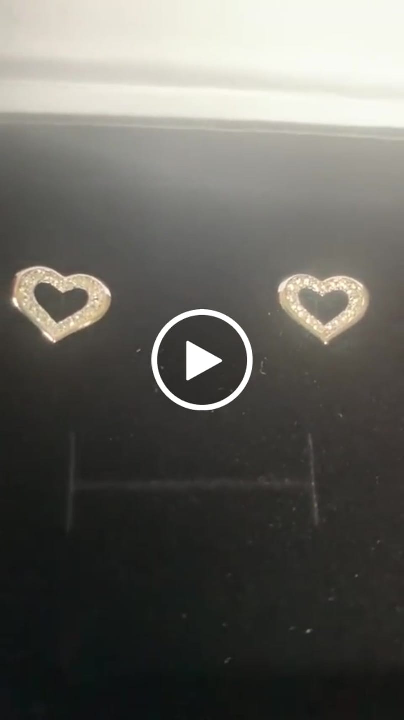 Customer video review of Dominique 18k White Gold Plated Silver Heart Stud Earrings with Swarovski Crystals