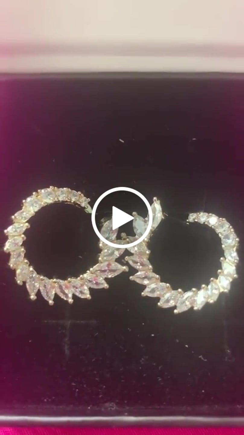 Customer video review of Adelyn 18k Gold Plated Sideways Hoop Earrings with Simulated Diamond Crystals — Final Sale