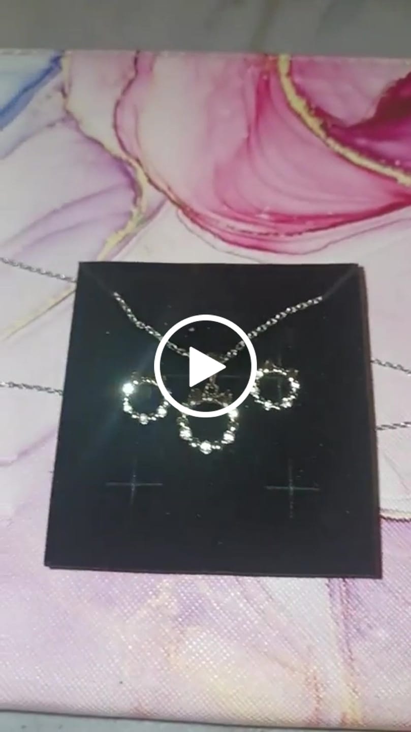 Customer video review of Edith 18k White Gold Plated Silver Ribbon Necklace and Earring Set with Swarovski Crystals
