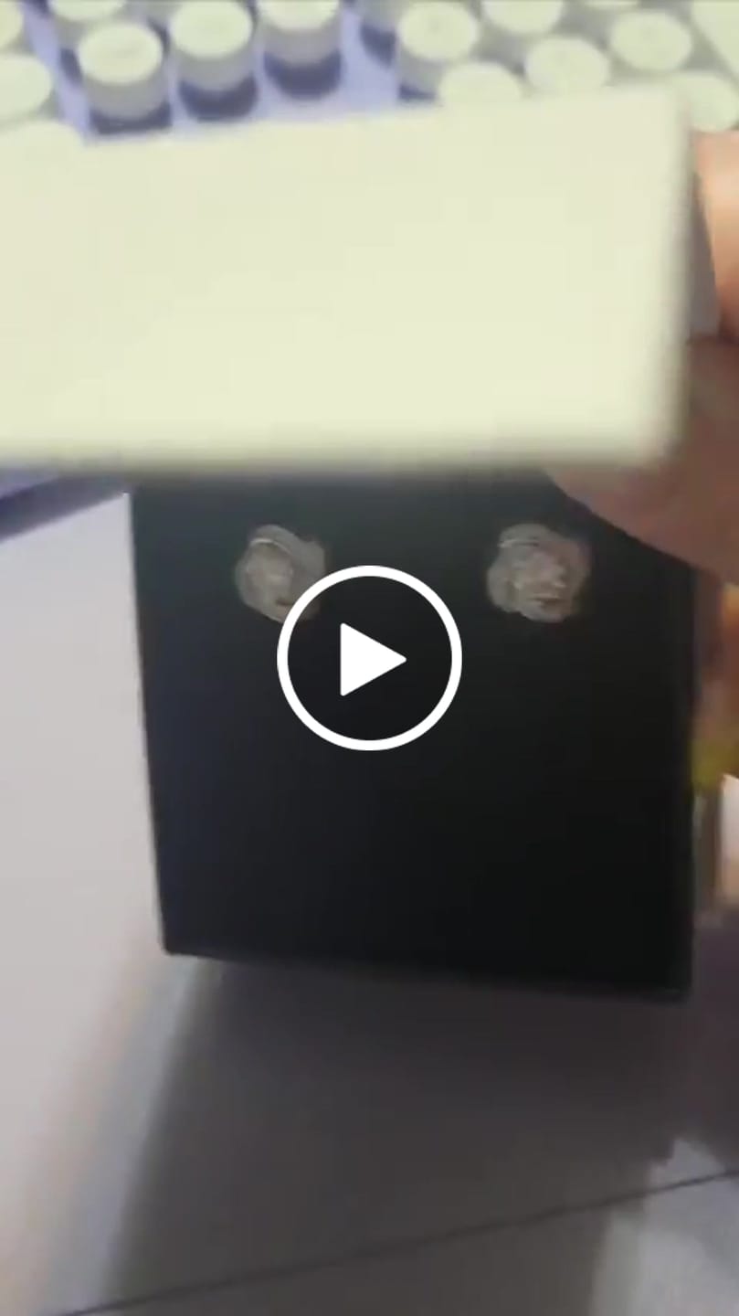 Customer video review of Eloise 18k White Gold Plated Stud Earrings with Solitaire Round Cut Swarovski Crystal