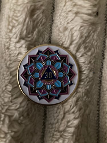 Customer photo review of 38 Year Sobriety Mint 'In Bloom' Lotus Flower Gold Plated AA Recovery Medallion - Thirty-Eight Year Chip/Coin - White